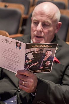 Martin Cooke, checking the programme for the evening
